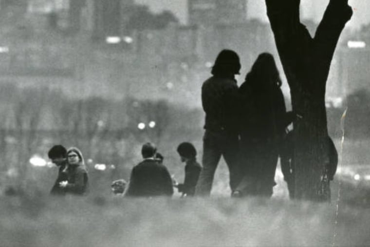 A few participants in the 1970 Earth Day Rally held at Belmont Plateau linger after the event. Over 26,000 people attended the rally on April 22, 1970.