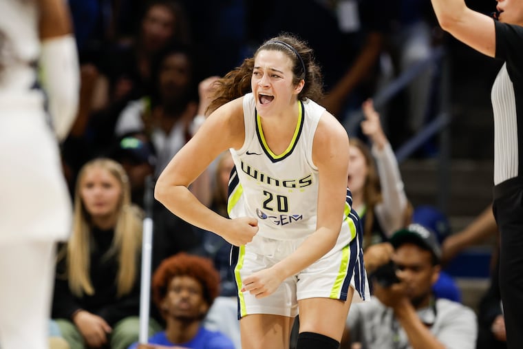 Former Villanova star and current Dallas Wings forward Maddy Siegrist celebrates a three-point shot during a WNBA basketball game against the Chicago Sky last year. Will she be playing in Philly someday?
