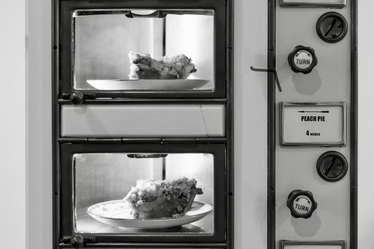 The Automat at Horn & Hardart was a series of windows filled from the rear with food. Customers fed coins into the slots.