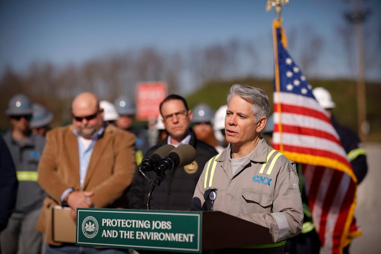 Gov. Josh Shapiro (center) looks on as CNX president and CEO Nick Deiuliis speaks at a media event in November 2023 announcing an environmental monitoring collaboration between the natural gas company and Pennsylvania.