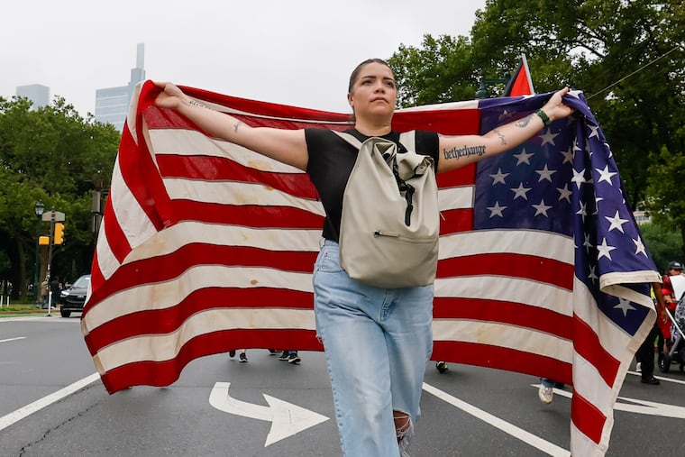 Whitney Bennett marches in the “No Kings” protest Saturday, June 14, 2025, in Philadelphia.