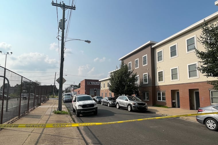 Crime scene tape at a shooting that occurred during an eviction on the 2200 block of East Auburn Street in Philadelphia in July 2023.