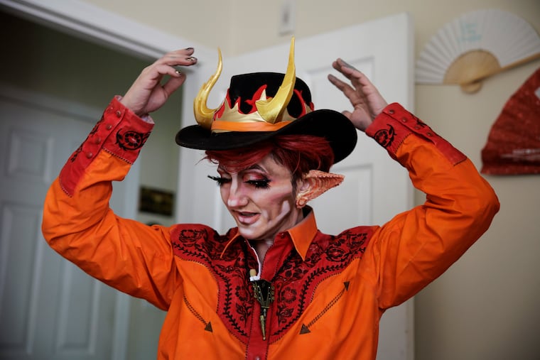 Joy Taney gets dressed as Henlo Bullfrog. Taney is performing on "King of Drag," the first reality TV competition for drag kings.