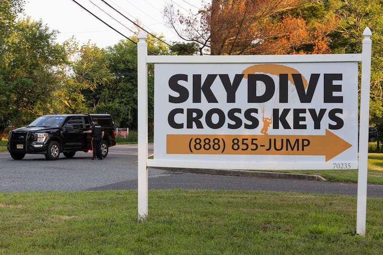 New Jersey State Police direct traffic near Cross Keys Airport in Gloucester County, N.J., where a skydiving aircraft crashed, injuring 5, on Wednesday, July 2, 2025.