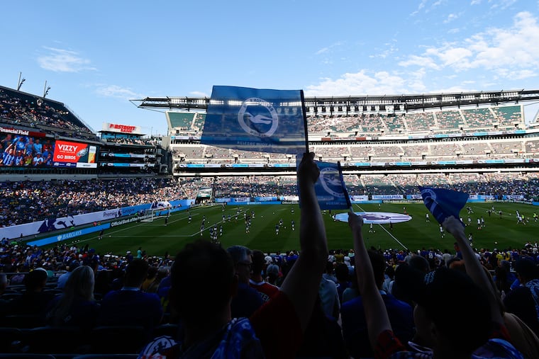 Fans wave the Brighton & Hove Albion flag before the English Premier League exhibition game against Chelsea at Lincoln Financial Field in South Philadelphia on Saturday, July 22, 2023. Chelsea will return to The Linc in 2025 for the FIFA Club World Cup which is staging a series of matches in Philadelphia.