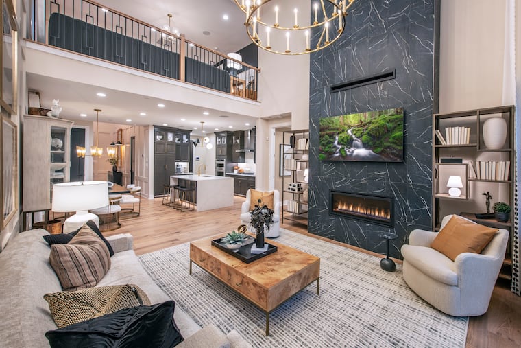 What a living space might look like at a home in the new Toll Brothers 55+ community that the homebuilder is planning for Upper Southampton, Bucks County. Construction on the site, with 115 carriage homes, is set to begin later this summer.