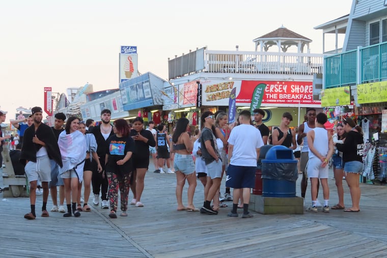 A file photo from 2023 shows a crowd of people on the Seaside Heights boardwalk on a June evening. Seaside Heights enacted new laws to curb late-night teen behavior in 2025.

