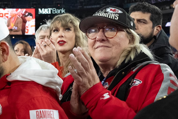 Taylor Swift stands with Donna Kelce after the Chiefs beat the Ravens in the 2024 AFC championship.
