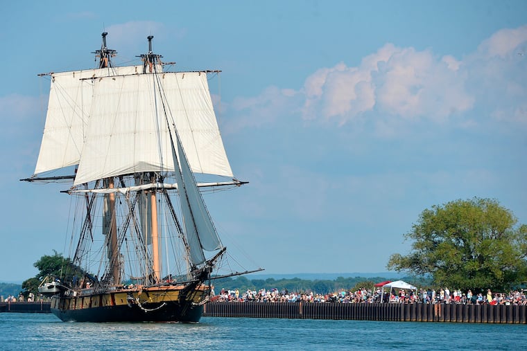 The U.S. Brig Niagara sails through the Presque Isle Channel leading the Parade of Sail opening the 2022 Tall Ships Erie festival on Presque Isle Bay in Erie.